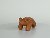 Медведь-игрушка. Медведь на четырёх лапах, из красной глины, украшен насечками. М.: глина; Т.: лепка, обжиг. 5,5 х 12,5 см.
